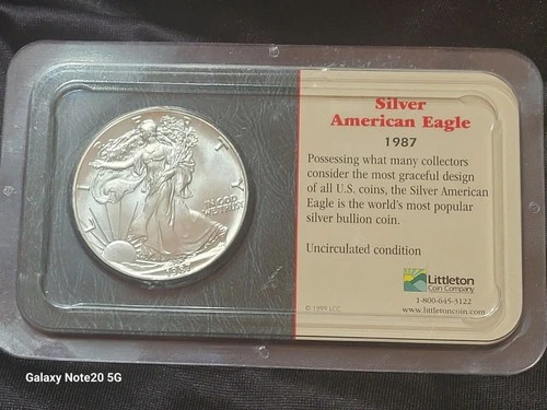 1987 AMERICAN EAGAL SILVER DOLLAR SEALED UNC VF