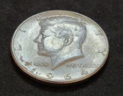 1964 Kennedy Half Dollar • 90% Silver • Circulated • X106