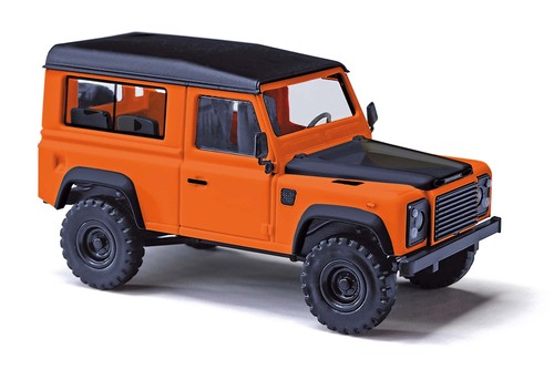 Busch 54309 HO montado última edición. Land Rover Defender 90 SUV naranja y negro | Zustand: New
