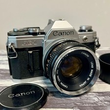 Canon AE-1 SLR 35mm Film Camera w/ Canon Lens FD 50mm F1.8 From Japan