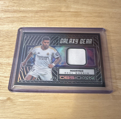 Panini 2023-24 Obsidian Galaxy Gear Rodrygo Real Madrid GG-RO /199 MEM