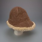 Brown suede vintage ranchero bucket hat with cream shearling lining and tan fabric brim, made in USA.
