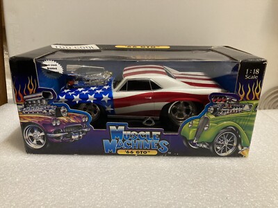 MUSCLE MACHINES 1966 PONTIAC GTO 1:18 SCALE DIE CAST. STARS