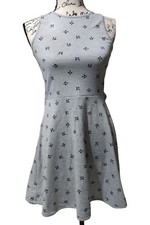 Sleeveless dress short in thick jersey. Seam at waist and flared skirt H&M
