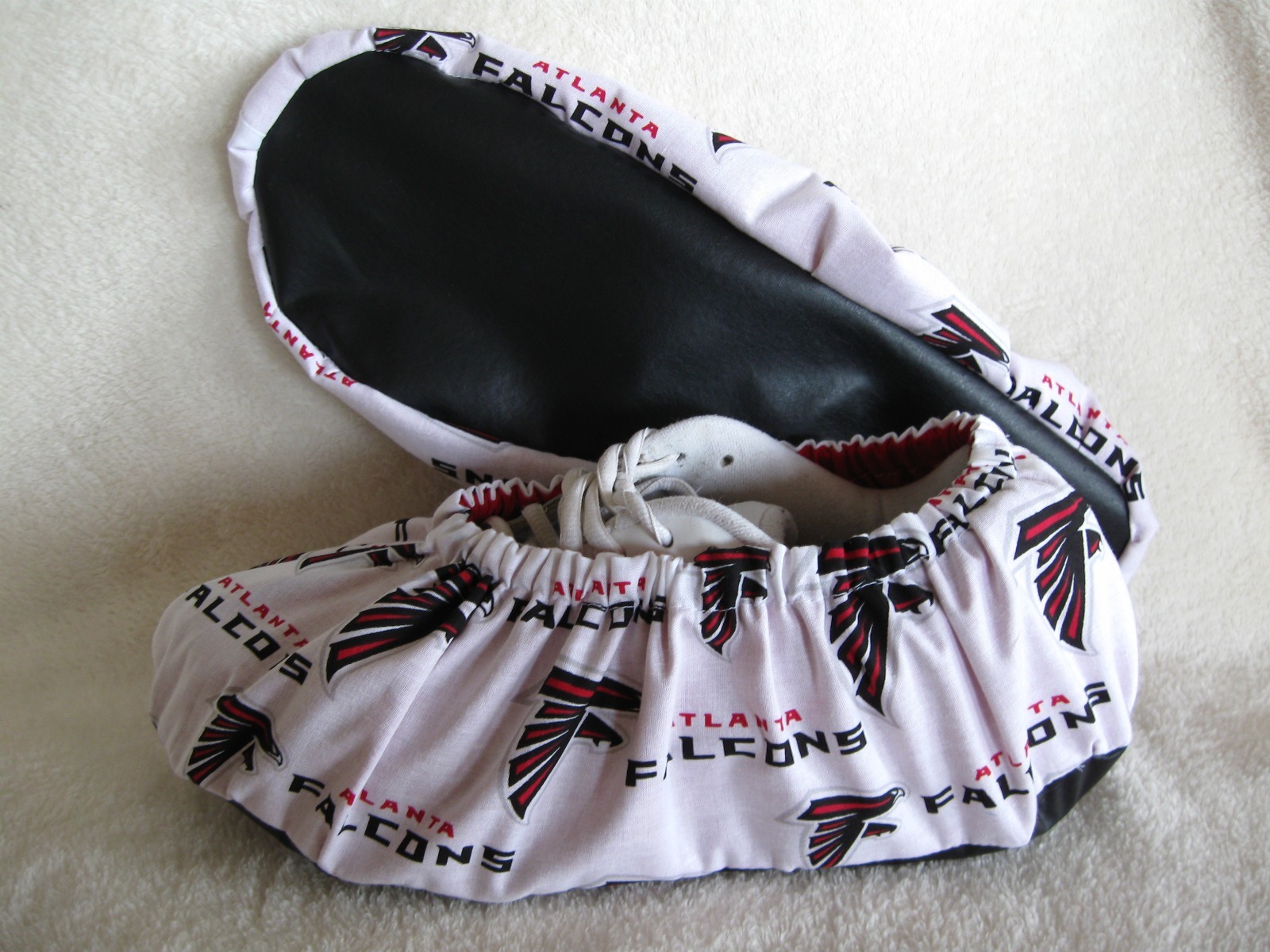 NFL Falcons bowling shoe covers. Men's size 10-12. Cotton, lined, vinyl soles 