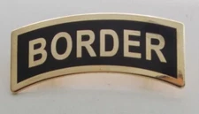 "BORDER" 2 inch tab with 2 clutches (Stetson) + a custom promo pin