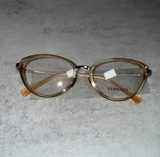 Versace VE 1244-1406 Eyeglasses, Pale Gold/Orange Transparent w/Demo Lens, 53mm