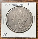 1887 Morgan Silver Dollar Coin in Fine+ circulated condition; 0.9 fine silver