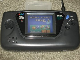 Sega Game Gear Set: Console, TV Tuner, Case, Battery Pack, Power Supply, 2 Games