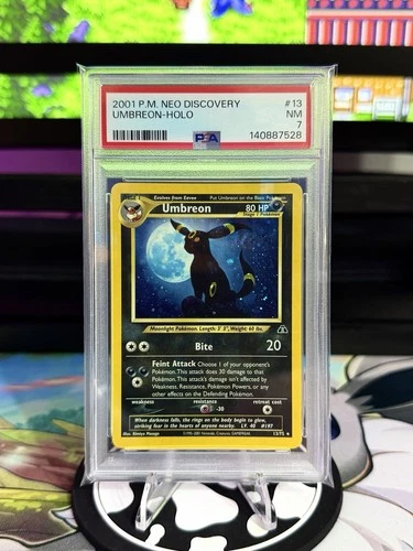 PSA 7 NM UMBREON-HOLO #13/75 2001 POKEMON NEO DISCOVERY 🌙