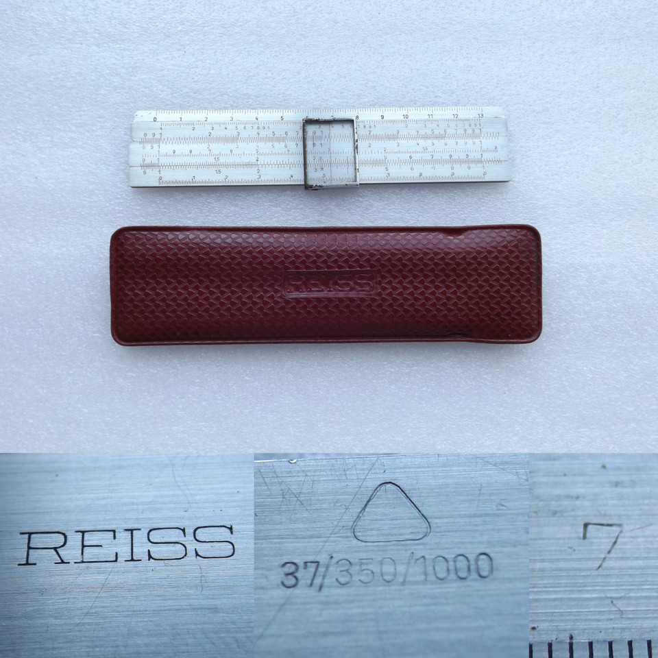 A REISS aluminum slide rule in its original leather case — East German engineering precision in a sleek, lightweight form rarely seen outside specialist collections.