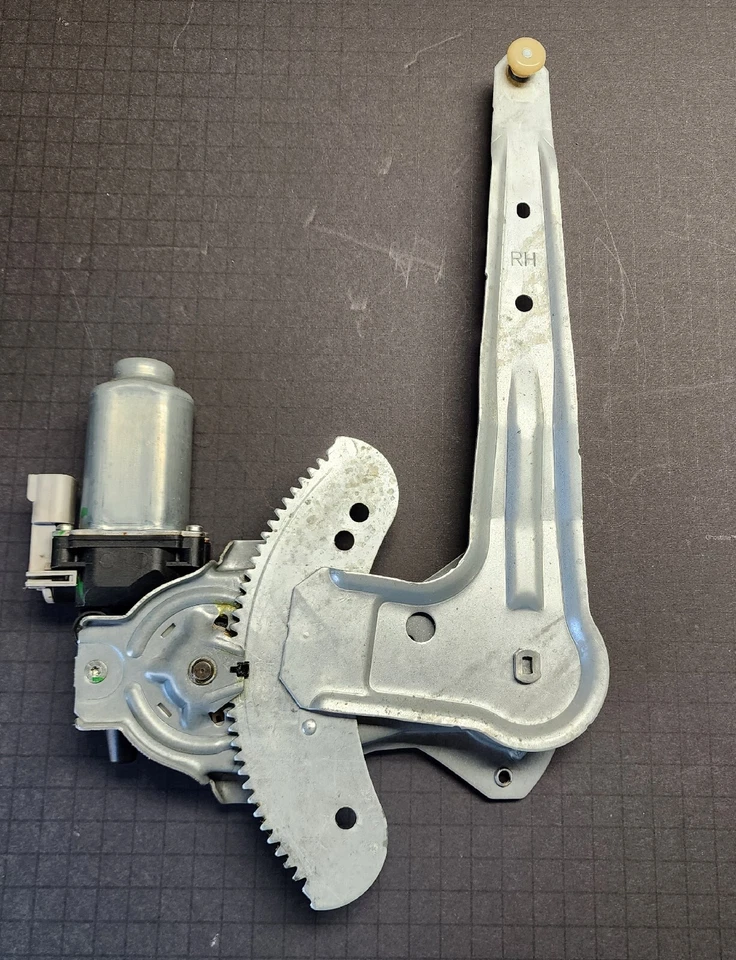 Regulador y motor de ventana eléctrica trasero derecho genuino Nissan Sentra 2000-06  Foto 2 de 2