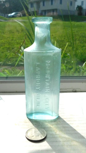 RARE AQUA MEDICINE FROM FREDERICK,MD EMBOSSED, MOUNTAIN CITY LAUNDRY BLUE