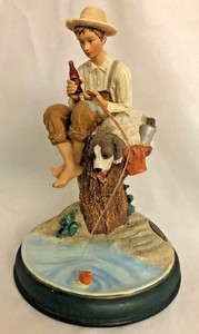 boy fishing figurine