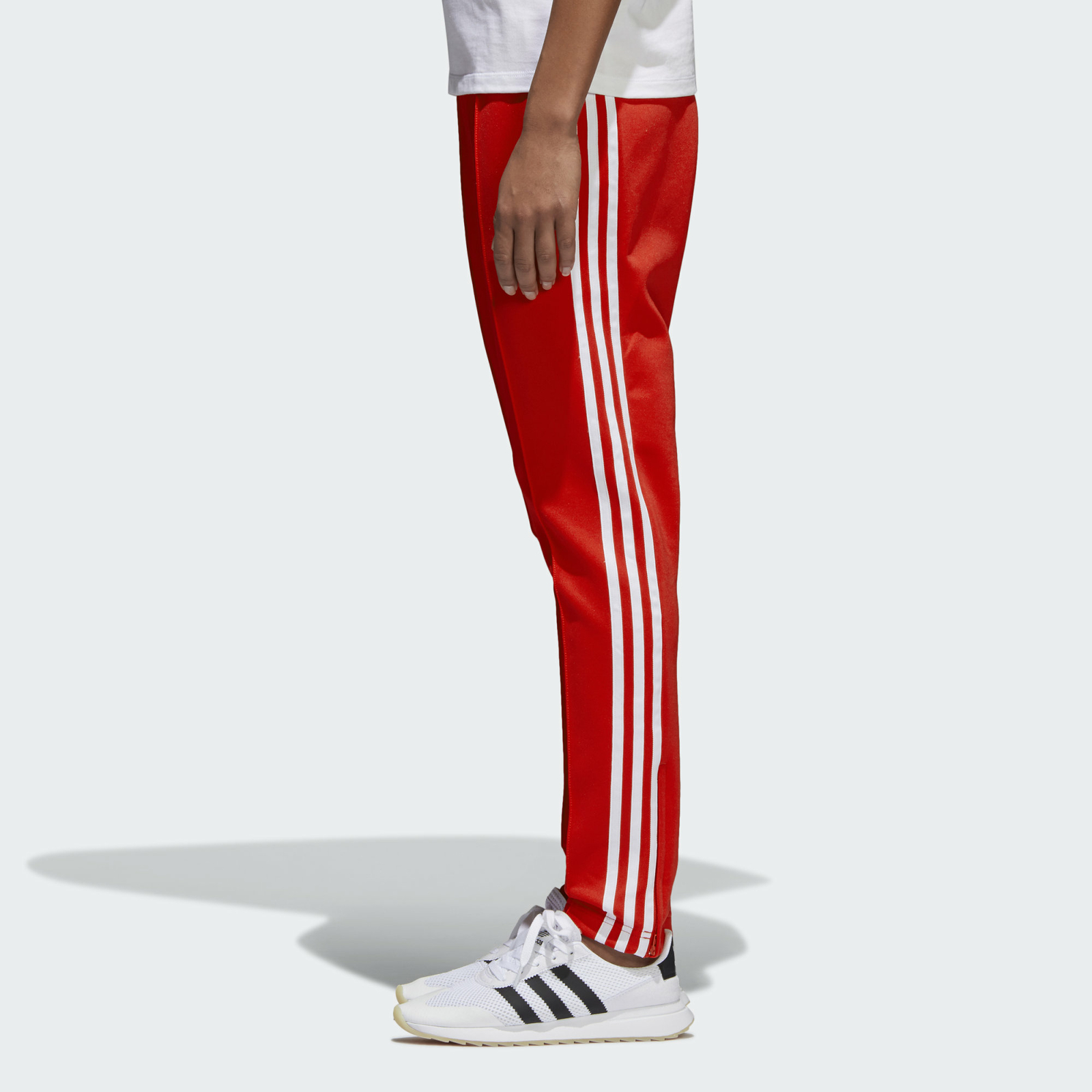 track pants red and white