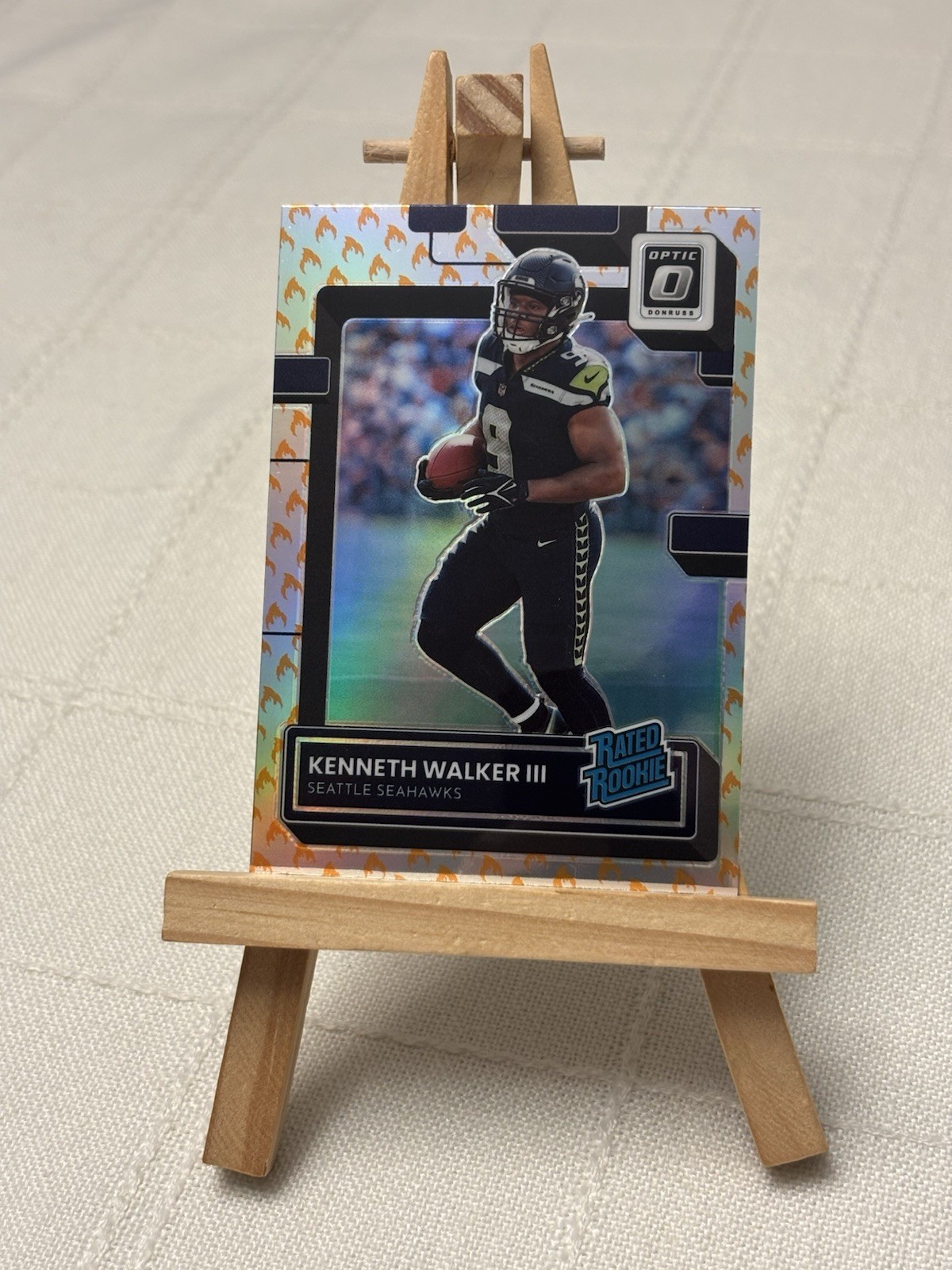 Kenneth Walker III 2022 Optic Rated Rookie Fire Emoji Prizm RC #218
