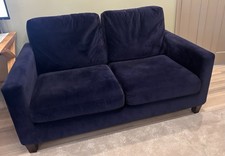 Made navy blue 2 seater sofa. Hardly Used