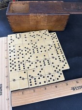 Antique Bone or celluloid Ebony Dominoes With Brass Spinner Pin Set Of 27