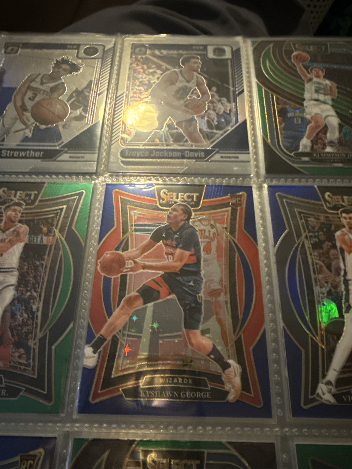 2024-25 Panini Select Concourse Kyshawn George #85 Blue Stars Prizm 10/20 (RC)