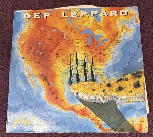 Def Leppard First Strike LP Heavy Metal Iron Maiden Saxon Dokken