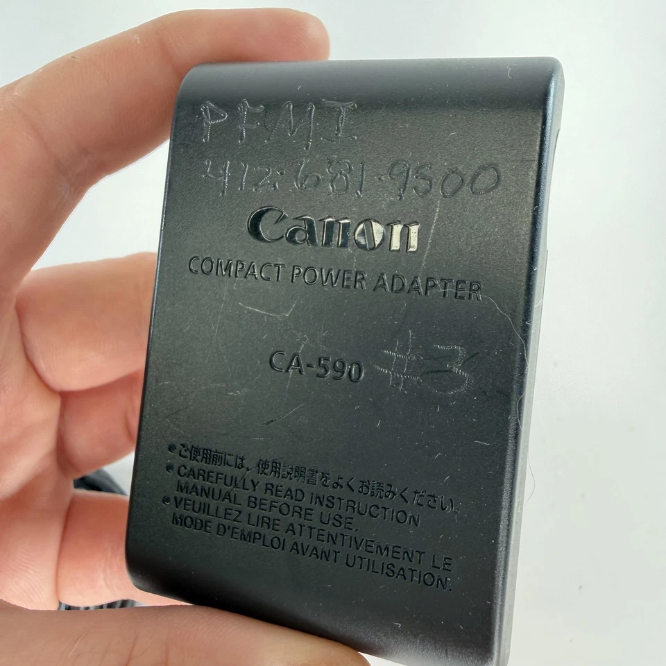 Adaptador de corriente compacto Canon CA-590 genuino OEM cargador de CA videocámara original Foto 2 de 4