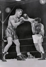 Tony Zale's famed left misses elusive Marcel Cerdan prepares to co- Old Photo