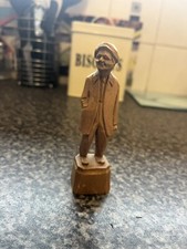 J Caron wooden sulpture