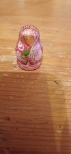 A Wooden Style Thimble Which Is Showing A Picture Of A Beautiful Russian Doll. 