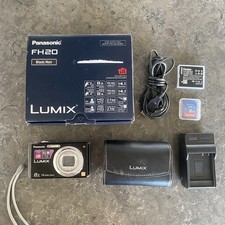 Panasonic Lumix DMC-FH20 Digital Camera BUNDLE SD Card Battery Charger Case