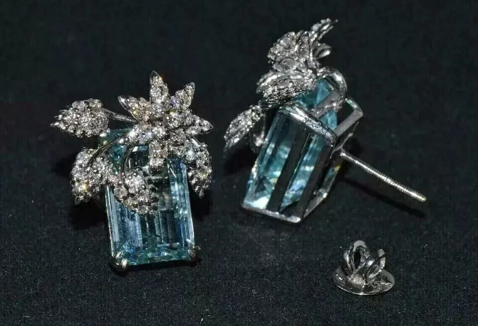 Pendientes de regalo de aguamarina de corte esmeralda de 2 quilates enchapados en oro blanco de 14 quilates Foto 2 de 4