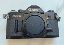 Canon AE-1 fotocamera reflex pellicola 35 mm ottime condizioni attrezzatura f...