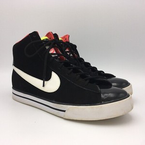 white nike high tops with black swoosh