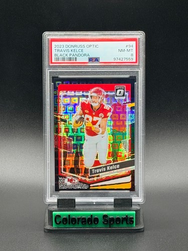 TRAVIS KELCE 2023 Panini Donruss Optic #94 Black Pandor Prizm 10/25 PSA 8