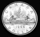 1966 $1 silver coin that is a great coin and in a paper flip