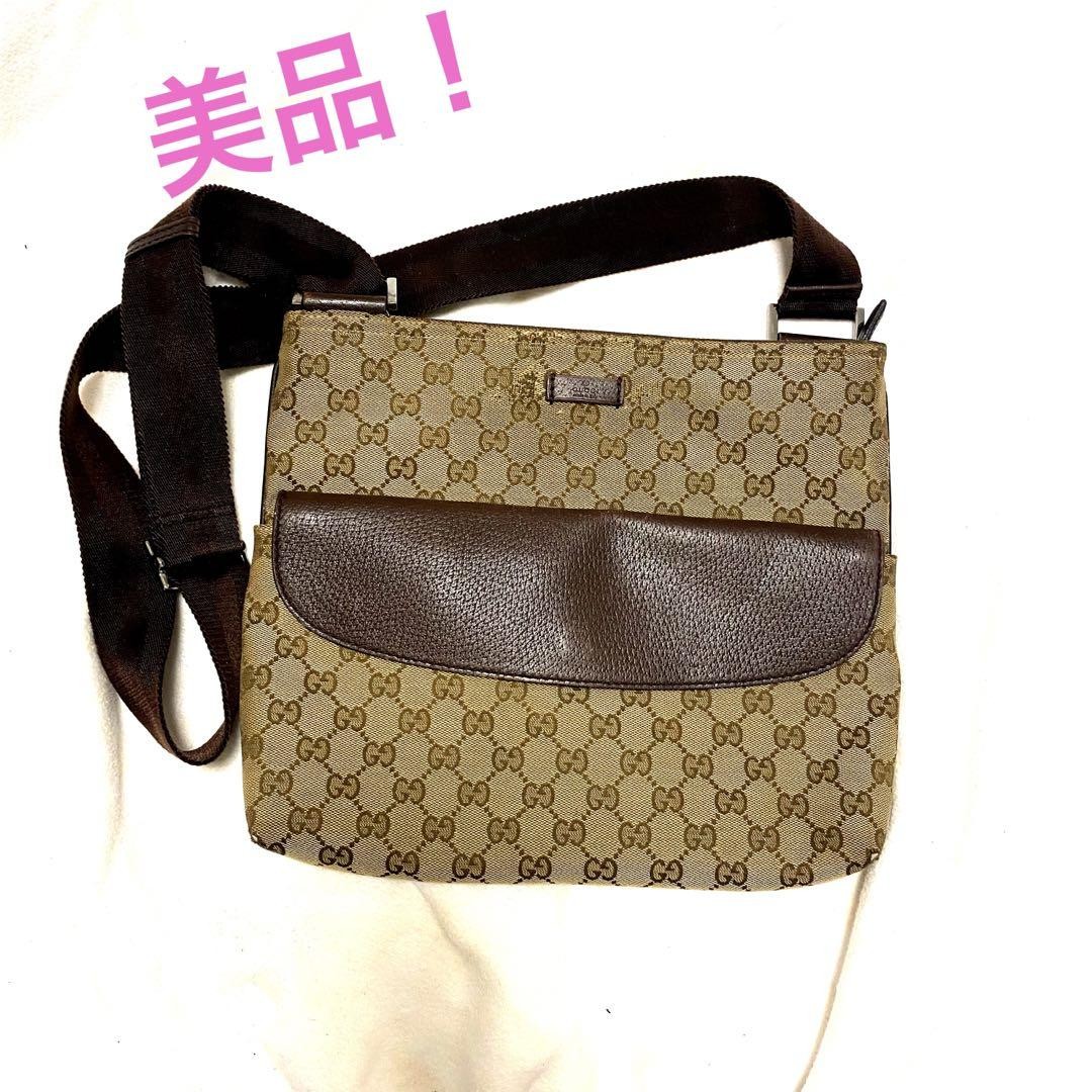 Gucci leather shoulder bag with multiple pockets for style and convenience