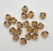 Swarovski Crystal Light Colorado Topaz Bicone Beads; 3mm, 4mm, 5mm, 6mm, 8mm