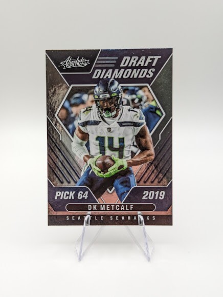 DK Metcalf #DD-13 Football Cards 2022 Panini Absolute Draft Diamonds trading card — raw and PSA graded price guide