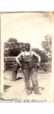 1930s Americana Photograph: Pomper Von Mueller Bib Overalls & Flexing Biceps