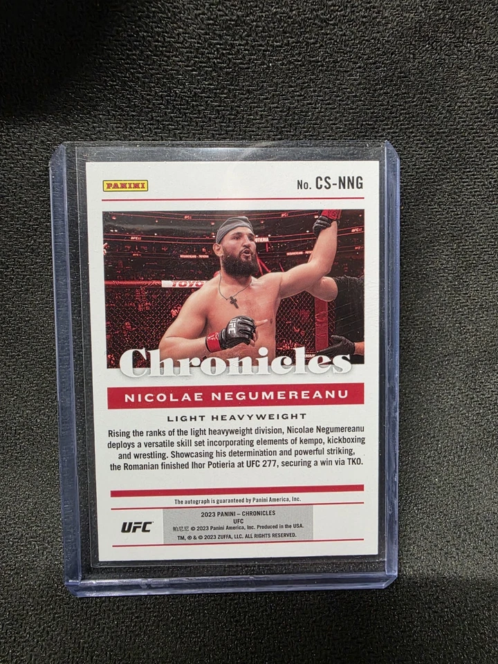 2023 PANINI CHRONICLES UFC AUTO NICOLAE NEGUMEREANU RC - Image 2 of 2