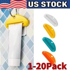 4X Plastic Tube Squeezer Toothpaste Dispenser Holder Rolling Bathroom Extract