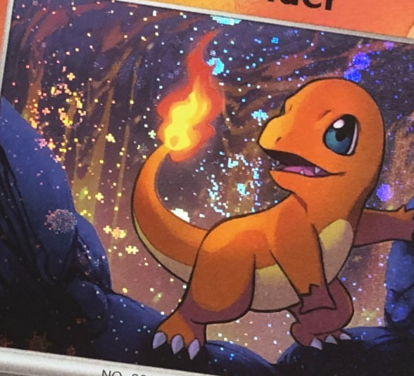Pokemon TCG Promo SVP 047 Holographic Cosmos Charmander w 2 Swirls + Fart Swirl