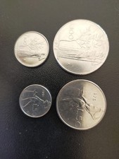 N. 4 monete italiane 2 da 100 lire e 2 da 50 lire, grandi e piccole.