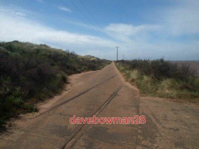 PHOTO  THE RAILS ON THE ROAD TO SPURN HEAD THE RAILS WERE USED FOR WIND POWERED