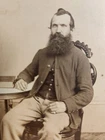 Unidentified seated Civil War soldier in sack coat with Harrisburg, PA, backmark