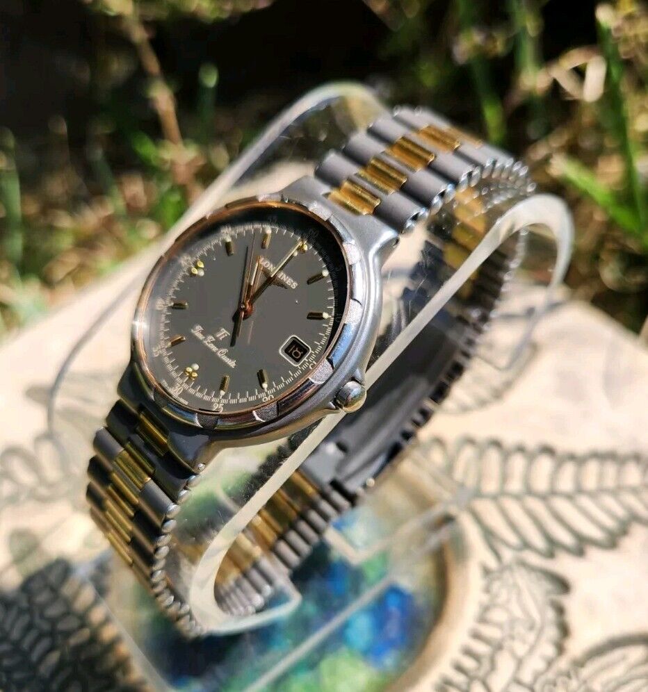 Longines Conquest Titanium Time Zone RARE Gunmetal Dial 33mm Longines Conquest Titanium Time Zone RARE Gunmetal Dial 33mm