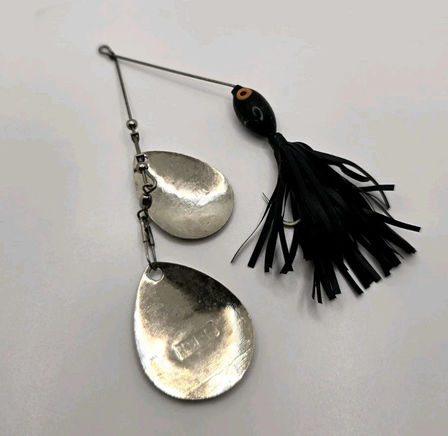 Señuelo de pesca Bomber doble hoja plateado Spinnerbait negro usado ligero Foto 4 de 4