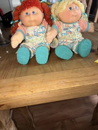 Two vintage Cabbage patch Dolls - Twins? One Red Hair And One Blonde