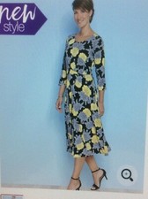 Brand new elegant black print dress size 24