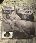TAYLOR SWIFT ELIZABETH TAYLOR 7” VIOLET GLITTER VINYL NEW SEALED RSD 2026