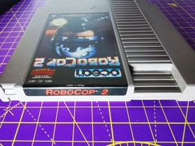 Cartucho de sistema de entretenimiento Robocop 2 NES Nintendo + funda antipolvo